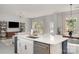 Open concept kitchen and dining area with modern appliances and natural light at 1849 Fleetwood Dr, Charlotte, NC 28208