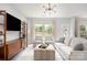 Bright living room with stylish furniture and natural light streaming through windows at 1849 Fleetwood Dr, Charlotte, NC 28208