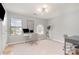 Bright office space with large windows, hardwood floors, and ample workspace at 1849 Fleetwood Dr, Charlotte, NC 28208