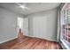 Bright bedroom with wood floors, closet, and ample natural light at 1863 New Castle Dr, Fort Mill, SC 29707