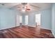 Spacious bedroom featuring vaulted ceiling, ceiling fan and hardwood floors at 1863 New Castle Dr, Fort Mill, SC 29707