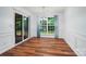 Dining room with hardwood floors and a sliding glass door to the outside at 1863 New Castle Dr, Fort Mill, SC 29707