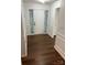 Inviting entryway with hardwood floors, elegant wainscoting, and a classic white front door at 1863 New Castle Dr, Fort Mill, SC 29707