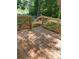 Outdoor deck perfect for entertaining surrounded by beautiful, lush greenery at 1889 Oak Hollow Rd, Gastonia, NC 28054