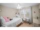 Bright bedroom features a ceiling fan, window, and a desk area at 1988 Clear Brooke Dr, Kannapolis, NC 28083