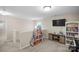 Versatile bonus room with plenty of space for play and entertainment, complete with a TV and playful decor at 1988 Clear Brooke Dr, Kannapolis, NC 28083