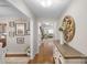 Welcoming entryway features hardwood floors, decorative mirror, and elegant decor at 1988 Clear Brooke Dr, Kannapolis, NC 28083