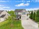Charming two-story home featuring a well-maintained lawn and a welcoming entrance with beautiful curb appeal at 1988 Clear Brooke Dr, Kannapolis, NC 28083