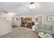 Open-concept living room seamlessly connects to the kitchen, creating a bright and inviting space for gatherings at 1988 Clear Brooke Dr, Kannapolis, NC 28083