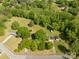 Aerial view of a wooded property and surrounding neighborhood at 2007 Green Peach Rd, Lancaster, SC 29720