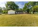 Expansive backyard featuring green lawn and mature landscaping at 2007 Green Peach Rd, Lancaster, SC 29720