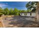 Backyard with a paved area and the house exterior at 2007 Green Peach Rd, Lancaster, SC 29720