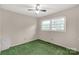 Bedroom featuring carpeted flooring, a ceiling fan, and a window at 2007 Green Peach Rd, Lancaster, SC 29720