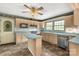 The spacious kitchen features an island, stainless steel appliances, and abundant cabinets and counter space at 2007 Green Peach Rd, Lancaster, SC 29720