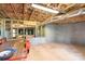 Unfinished basement with framed walls, ready for customization and future expansion at 202 Timber Lake Dr, Troutman, NC 28166