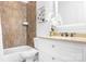 Updated bathroom featuring a bathtub with decorative tile, a classic vanity, and stylish fixtures at 202 Timber Lake Dr, Troutman, NC 28166