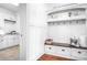 Well-organized mudroom with built-in storage, bench, and easy access to laundry at 202 Timber Lake Dr, Troutman, NC 28166
