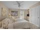 This bedroom has carpet, neutral walls, one window and an entertainment center at 204 Limerick Dr, Matthews, NC 28104