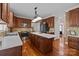 Spacious kitchen with modern appliances, custom cabinets, and a central island at 204 Limerick Dr, Matthews, NC 28104