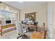 Bright home office with large window, neutral walls, desk, and ceiling fan at 204 Limerick Dr, Matthews, NC 28104