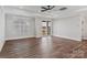 Spacious living room with hardwood floors, a ceiling fan, and sliding door access to the outdoors at 2081 Fordhill St, Rock Hill, SC 29732