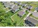 Aerial view of a home showcasing its well-manicured lawn, fencing, and neighborhood setting at 2124 Katie Alice Cir, Waxhaw, NC 28173
