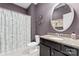 A clean bathroom featuring a toilet, shower with curtain, and a vanity with a granite countertop at 2124 Katie Alice Cir, Waxhaw, NC 28173