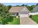 Charming single Gathering home with well-manicured lawn and attached two-car garage at 2124 Katie Alice Cir, Waxhaw, NC 28173