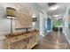 Tastefully decorated hallway with console table and view into the living room at 2124 Katie Alice Cir, Waxhaw, NC 28173
