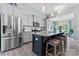 Modern kitchen features stainless steel appliances and granite countertops at 2124 Katie Alice Cir, Waxhaw, NC 28173