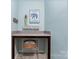 Practical laundry room space with decor shelves and a large counter area with storage space below at 2124 Katie Alice Cir, Waxhaw, NC 28173