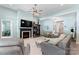 Bright and airy living room with comfortable seating, fireplace and modern decor at 2124 Katie Alice Cir, Waxhaw, NC 28173