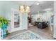 Open-concept living and kitchen area with lots of natural light, neutral walls and modern decor at 2124 Katie Alice Cir, Waxhaw, NC 28173