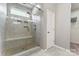 Modern tile shower with glass door and dual shower heads offers a spa-like experience at 2124 Katie Alice Cir, Waxhaw, NC 28173