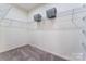 A walk-in closet with wire shelving on all sides of the space for maximum storage at 2124 Katie Alice Cir, Waxhaw, NC 28173