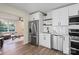 Well-lit kitchen featuring stainless appliances, stylish backsplash, and an open concept design at 232 Avery St, Fort Mill, SC 29715