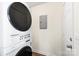 Laundry room with a washer, dryer, hardwood floors, and door to another room at 232 Avery St, Fort Mill, SC 29715