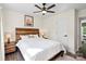 Inviting bedroom offers a ceiling fan, stylish furnishings, and a serene ambiance at 232 Avery St, Fort Mill, SC 29715