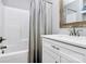 Bright bathroom featuring a white vanity, bathtub, and chrome fixtures at 25674 Old School Rd, Oakboro, NC 28129