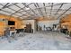This unique garage area provides ample space for projects and creative pursuits at 25674 Old School Rd, Oakboro, NC 28129