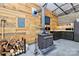 The garage offers wood paneling, a wood burning stove and overhead lighting at 25674 Old School Rd, Oakboro, NC 28129