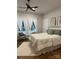 Inviting bedroom with a comfortable bed, plush pillows, and sheer curtains at 300 Kelly St, Statesville, NC 28677