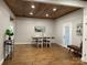 Bright dining room with a wooden table, chairs, and natural light from windows at 300 Kelly St, Statesville, NC 28677