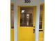 Bright yellow front door with sidelights and glass panel at 300 Kelly St, Statesville, NC 28677