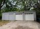 Two-car garage with driveway and ample space for vehicles and storage at 300 Kelly St, Statesville, NC 28677