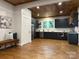 Spacious kitchen featuring dark cabinets, marble countertops, and stainless steel appliances at 300 Kelly St, Statesville, NC 28677