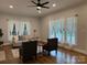 Bright living room with hardwood floors, large windows, and comfortable seating at 300 Kelly St, Statesville, NC 28677