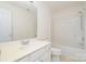 Bright bathroom featuring a white vanity with modern fixtures, a large mirror, and a shower-tub combination at 3007 Sandbox Cir, Indian Trail, NC 28079