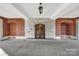 Covered entrance with brick accents and elegant lighting, offering a grand welcome at 301 W 10Th St # 402, Charlotte, NC 28202