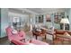 Inviting living room with hardwood floors, built-in shelving, and open layout to dining area at 301 W 10Th St # 402, Charlotte, NC 28202